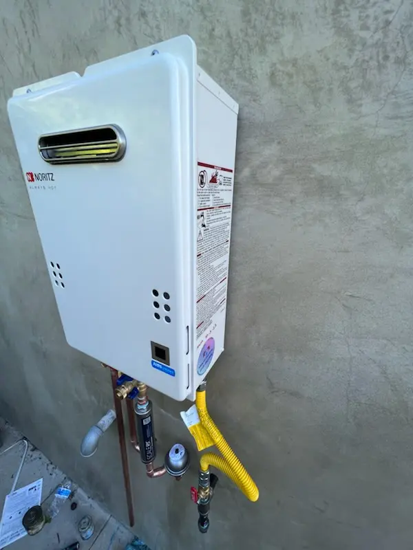 Tankless water heater installation for The Moorings homes